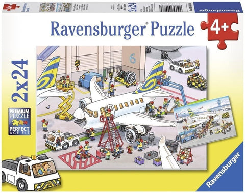 Ravensburger dėlionė 2x24 dalių vaikams (4+), dėžutės vaizde spalvinga lėktuvo remonto angaro ir darbininkų scena