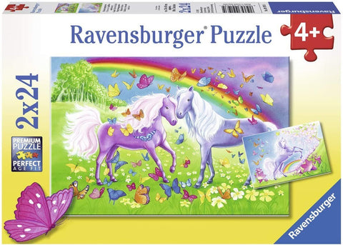 Dėlionė Ravensburger 2×24 d. su dviem violetiniais vienaragiais, vaivorykšte ir daug drugelių ant dėžutės priekinio plano