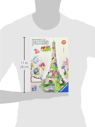 3D dėlionė Ravensburger Eifelio bokštas, spalvota pop‑art pakuotė rodanti 28 cm aukščio modelį, amž. rekom. 12+