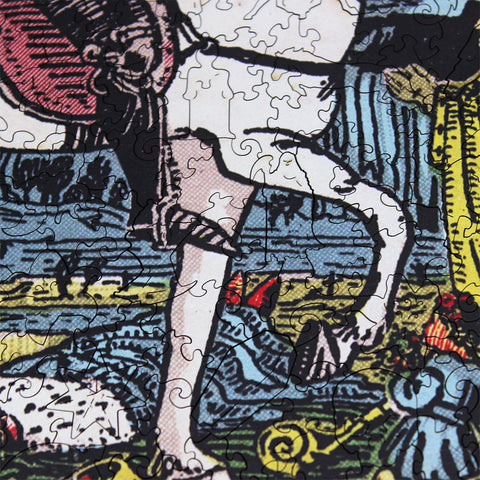 Dėlionė 500 dalių su retro komikso iliustracija, arti rodomas surinktas fragmentas ir matomos jungiančios detalės