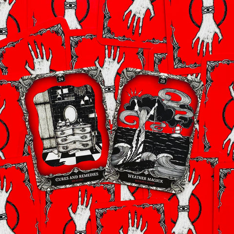 Tarot kortos raudonomis nugarėlėmis, dvi atvertos kortos Cures and Remedies ir Weather Magick, detali juoda‑balta iliustracija