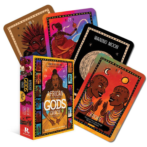 Kortų rinkinys African Gods Oracle su spalvota dėže ir atverstomis iliustruotomis kortomis, matomas priekinis viršelis ir kelių kortų variantai