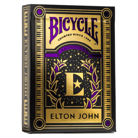 Bicycle kortos Elton John specialus leidimas juodoje dėžutėje su auksiniu folijos raštu ir purpuriniais akcentais