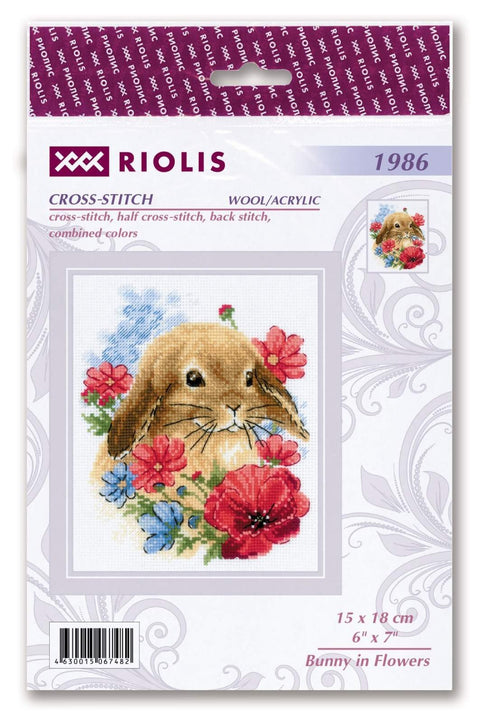 Kryželių rinkinys Riolis su triušio dizainu ruda spalva ir raudonomis bei mėlynomis gėlėmis, pakuotė 15×18 cm