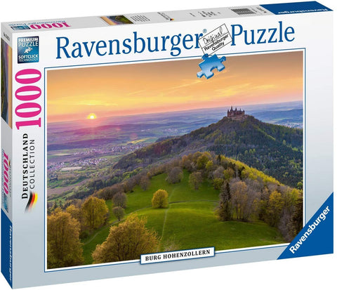 Dėlionė Ravensburger 1000 detalių, kalnų peizažas su Hohenzollern pilimi ir ryškiu saulėlydžiu, pakuotės priekinė pusė