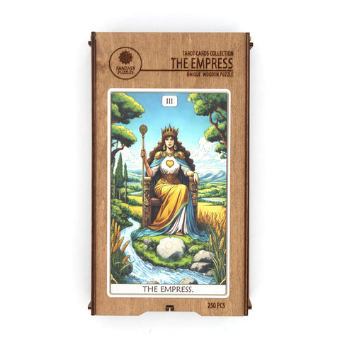 Medinė dėlionė The Empress (250 det.) pakuotės priekinė dalis su spalvinga tarot kortos iliustracija ir medine dėžute