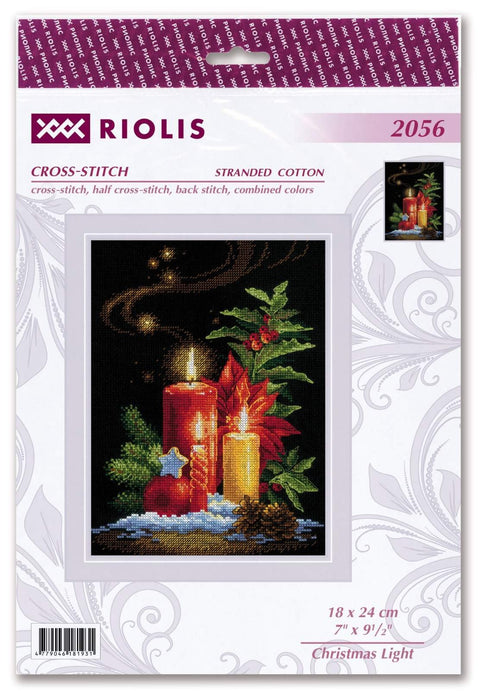 Kryželių rinkinys Riolis 18×24 cm – šventinis žvakių dizainas ant juodo fono, supakuotos pakuotės priekinė dalis
