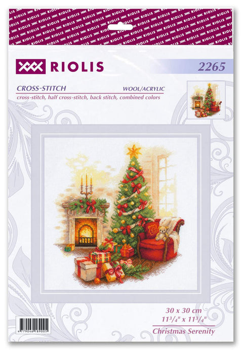 Kryželių rinkinys Riolis 30x30 cm – Kalėdinė scena su eglute, židiniu, dovanomis ir raudonu foteliu, pakuotės priekis