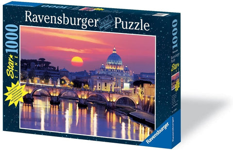 Dėlionė Ravensburger 1000 dalių „Roma saulėlydis“, tamsiai mėlyna dėžutė, kampu parodyta pakuotės priekinė dalis