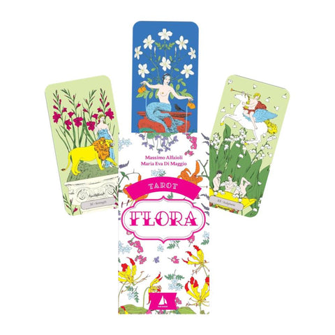 Tarot kortos Flora su dekoratyvia balta gėlių dėže ir trimis išskleistomis spalvotomis kortomis