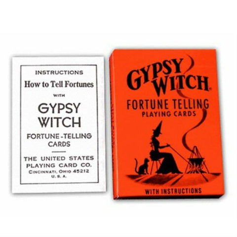 Burtažaidžių kortos Gypsy Witch: oranžinė dėžutė su raganiška figūra ir šalia matomas pridėtinis instrukcijų lapas