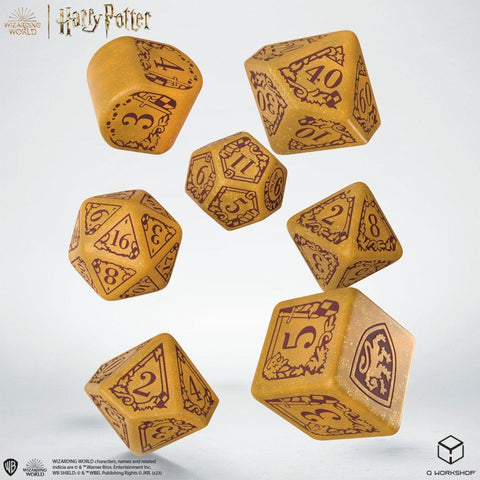 RPG kauliukų rinkinys Harry Potter — 7 auksiniai blizgantys polihedriniai kauliukai su rudos spalvos skaičiais ir herbo detalėmis
