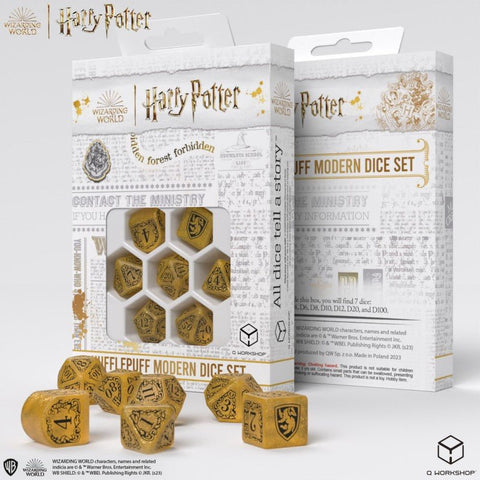 Hufflepuff kauliukų rinkinys, auksiniai 7 žaidimų kauliukai su neryškiu herbo piešiniu ir komplekto dėžute parodyta iš priekio