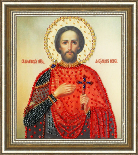 Ikona šventojo, rėmelyje, rankų darbo raudona mantija su raudonais ir juodais karoliukais ir auksine aureole