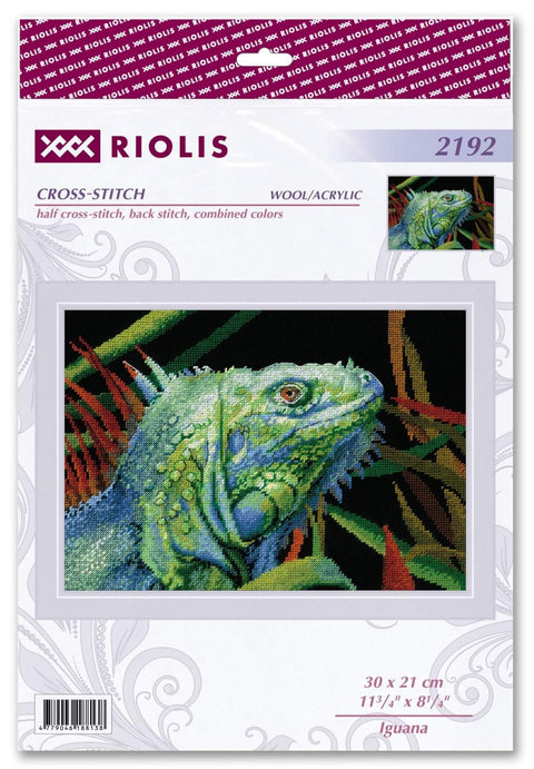 Kryželių rinkinys Riolis Iguana — pakuotės priekinė dalis su žaliu igvanos portretu, 30×21 cm, vilna/akrilas