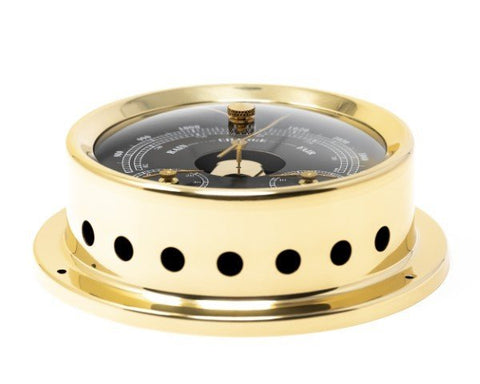 barometras iš žalvario su juodu ciferblatu, įmontuojamas laivui, fotografuotas iš šono arti, matomos vėdinimo angos