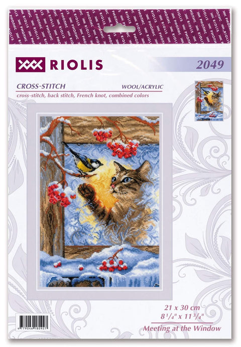 Kryželių siuvinėjimo rinkinys Riolis 21×30 cm — žieminis katės ir paukštelio motyvas prie lango, vilna/akrilo siūlai, pakuotės priekinė dalis