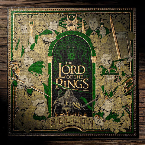 Dėlionė The Lord of the Rings, žalia‑auksinė detalizuota iliustracija su veikėjų portretais ir centruotu logotipu