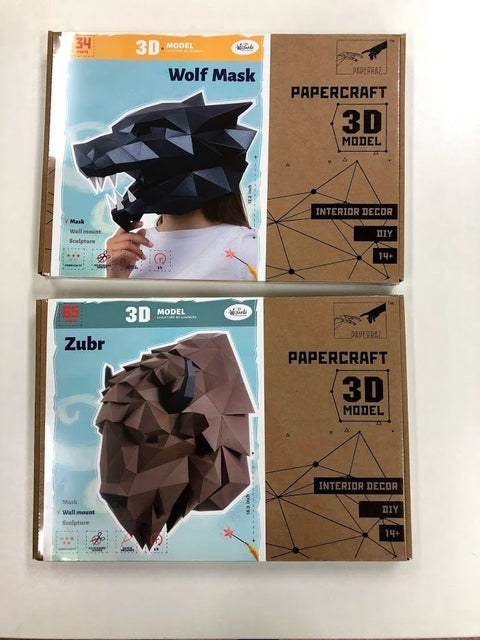 3D papercraft rinkiniai: juoda vilko kaukė viršuje ir rudas stumbro (zubr) galvos modelis apačioje, sienų dekorui ir DIY rinkiniams