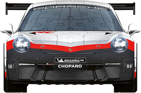 Dėlionė lenktyninio Porsche priekinės perspektyvos, baltai‑juoda su raudonais akcentais, artimas ir detalus