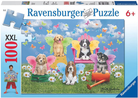 Dėlionė Ravensburger 100 XXL — spalvingas dėžutės dizainas su keturiais šuniukais ir drugelių sparnais, skirta vaikams nuo 6 metų