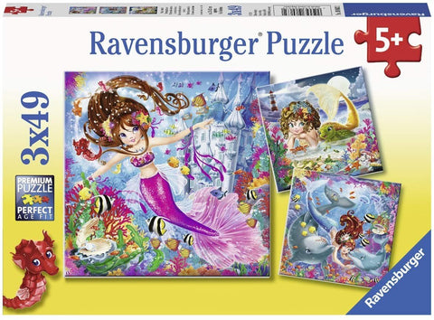 Dėlionė Ravensburger, 3×49 dalių rinkinys su trimis spalvingomis undinių scenomis ir didesne centrine iliustracija, skirta 5+ vaikams