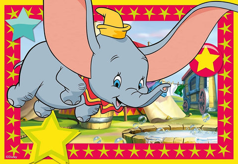 Dumbo dėlionė 100 dalių, skraidantis Dumbo su didelėmis rausvomis ausimis ir cirko fone — ryški, vaikams skirta versija