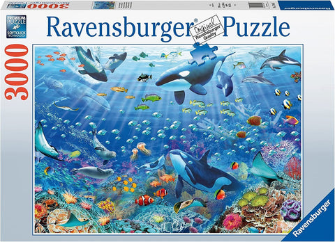 Ravensburger dėlionė 3000 detalių, ryški vandenyno scena su orkų, delfinų ir koralų rifais ant dėžutės priekio
