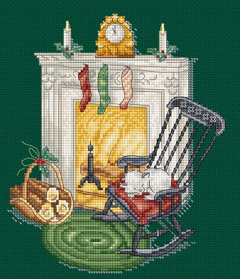 Siuvinėjimo rinkinys su žaliu fonu, dekoratyviniu židiniu, linguojančiu juodu krėslu, miegančiu baltu kačiuku ir malkų krepšiu