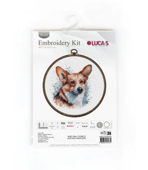 Siuvinėjimo rinkinys LUCA‑S su Welsh Corgi motyvu, pakuotės priekinė dalis su rėmeliu ir spalvotomis siūlomis