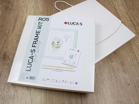 Kryželių rinkinys LUCA‑S su rėmeliu, baltame kvadratiniame dėkle R05, pakuotės viršus parodytas iš viršaus