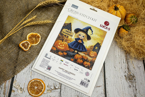 Kryželių rinkinys LUCA‑S Happy Halloween su mėlyna raganiukės figūra ir oranžiniais moliūgais, pakuotė rodoma iš viršaus