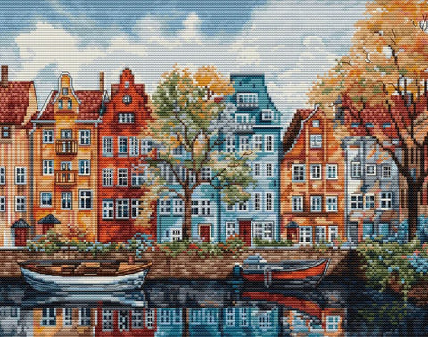 kryželių rinkinys: rudeniškas kanalų namų motyvas su mėlynais ir oranžiniais fasadais bei valtimis, 40×30 cm
