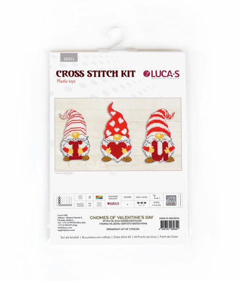 Kryželių rinkinys LUCA‑S su trimis raudonais Valentino nykštukų ornamentais ant baltos pakuotės