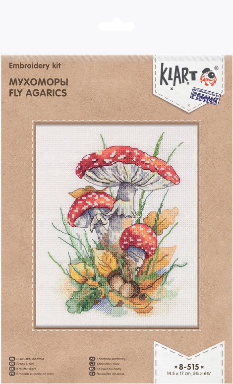Siuvinėjimo rinkinys Klart — raudoni musmirai ant 14,5×17 cm drobės, pakuotės priekinis langas su dizainu