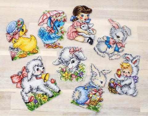 Siuvinėtos aplikacijos: rinkinys 9 pastelinių Velykų motyvų (zuikiai, avytės, viščiukas), vintage stilius, plokščiai išdėstyti