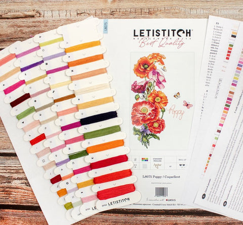 kryželių rinkinys LETISTITCH su aguonų raštu, išdėstytomis spalvotomis gijų kortelėmis ir instrukcijų lapais