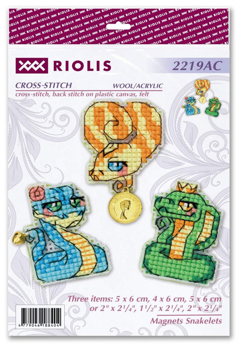 Kryželių magnetų rinkinys Riolis: trys gyvatėlės (mėlyna, žalia, oranžinė), vilna/akrilas, dydžiai ~5×6/4×6/5×6 cm, matavimo moneta pakuotėje