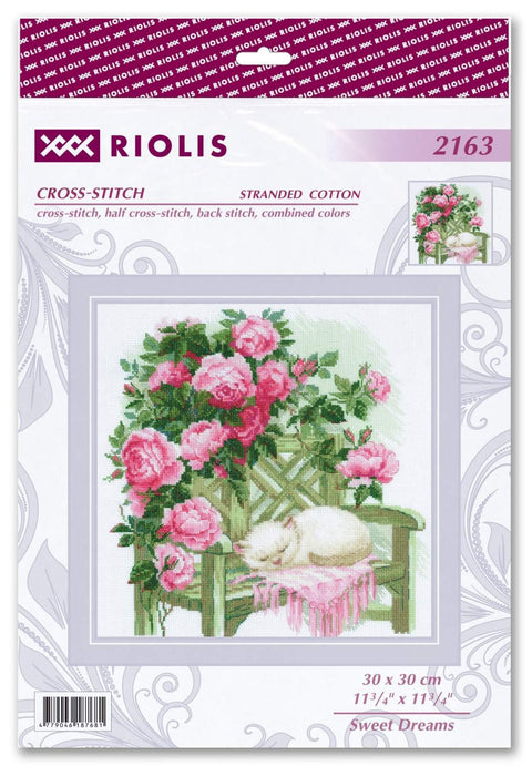 Kryželių rinkinys Riolis 30x30 cm – baltas miegančio katino motyvas ant suolelio tarp rožių, rožinė ir žalia paletė