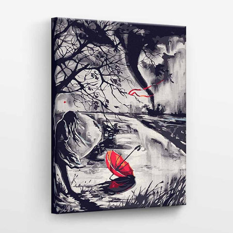 Drobė 40×60 cm su juodo–balta naktine pakrante ir ryškiu raudonu atverstu skėčiu, kampinis galerijos variantas