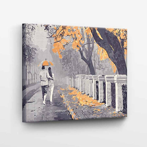 Drobė rudeniška pora po skėčiu, pilkai–oranžinė 40×50 cm spauda ant ištemptos drobės, priekis su apatinio krašto detale