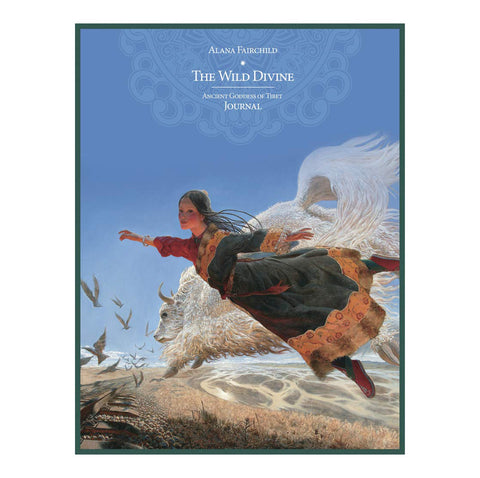 Sąsiuvinis The Wild Divine su mėlynu tvirtu viršeliu, aut. Alana Fairchild, iliustracija: skraidanti moteris ant baltos jakos