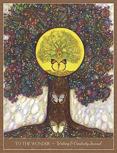 rašymo žurnalas To The Wonder su spalvingu geltonai rudu priekiu, drugeliai ir saulės ratas ant viršelio pabrėžia kūrybinę temą