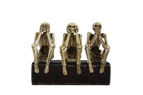 Skeletai „nematau, negirdžiu ir nesakau blogio". Išmatavimais: 15x8x12cm.