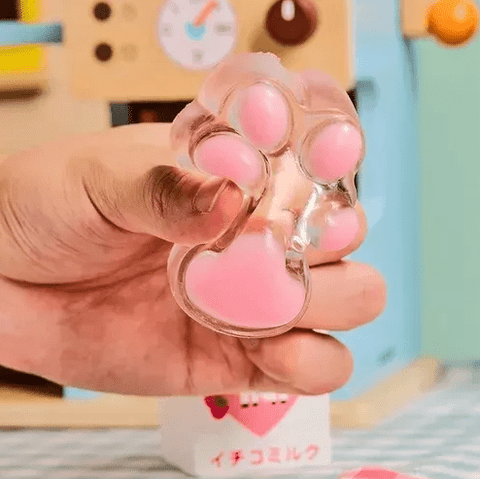 Permatoma katės letenėlė squishy 7 cm – antistresinis jutiminis žaislas
