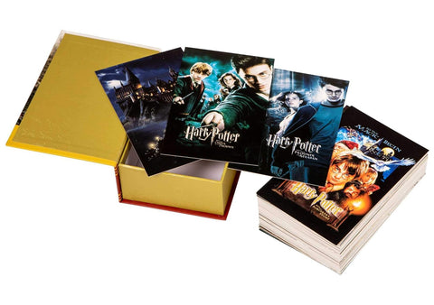 Harry Potter atvirukai komplekte su aukso spalvos dėže, apie 50 skirtingų filmo afišų formato atvirukų, dalis išdėstyta fane