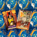 tarot kortos su kortomis „Drąsa ir Įkvėpimas“ bei „Meditacija kūrybai“ ant mėlyno katinų fono