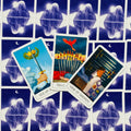 tarot kortos trijų kardų išklotinė: Ace, Ten ir Nine of Swords atverstos ant mėlynos žvaigždėtos nugarėlės