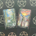 tarot kortos — dvi atverstos iliustruotos kortos (The Maiden and the Imbolc Lamb ir The Gathering) ant juodo fono su pentagramomis
