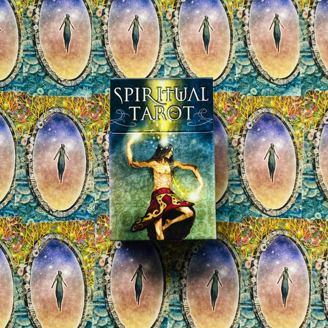 Spiritual Tarot kortos dėžutė su magišku šokėjo piešiniu, centre ant spalvingo ovalių portalų fono